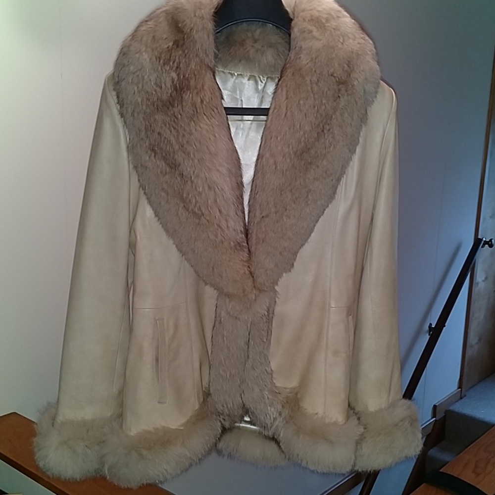 Leather coat with fur trim